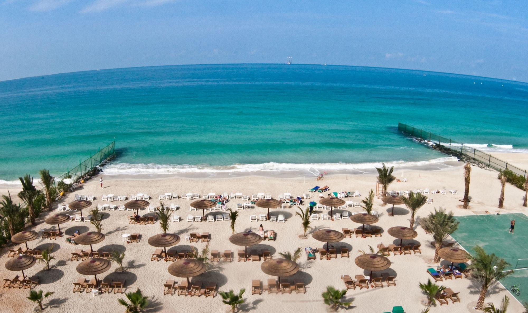 ซาฮารา บีช รีสอร์ต แอนด์ สปา Hotel ชาร์จาห์ ภายนอก รูปภาพ Beach at Jumeirah Beach Hotel